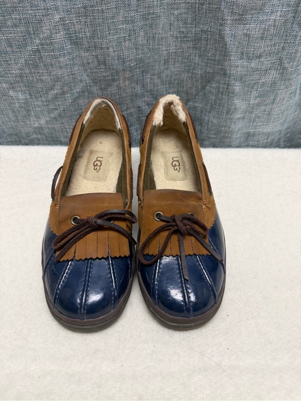 UGG Navy and Chestnut Leather Tassel Moccasins